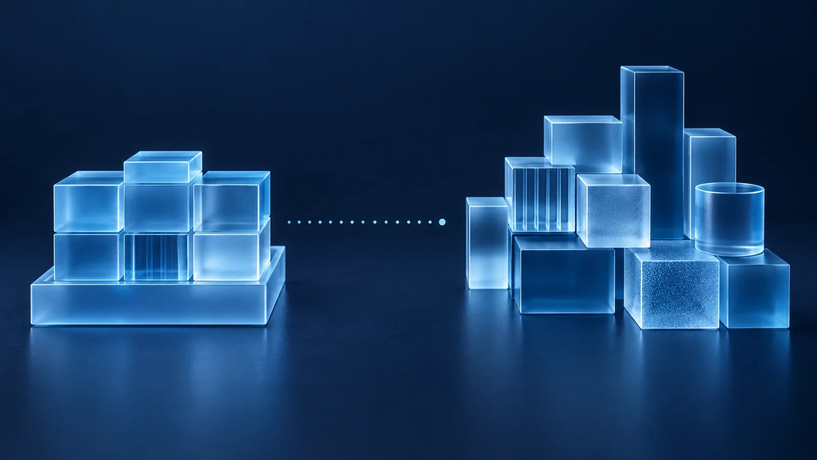 Two separate groups of translucent blue glass blocks on a dark navy surface, connected by a dotted line that stops before the second group.